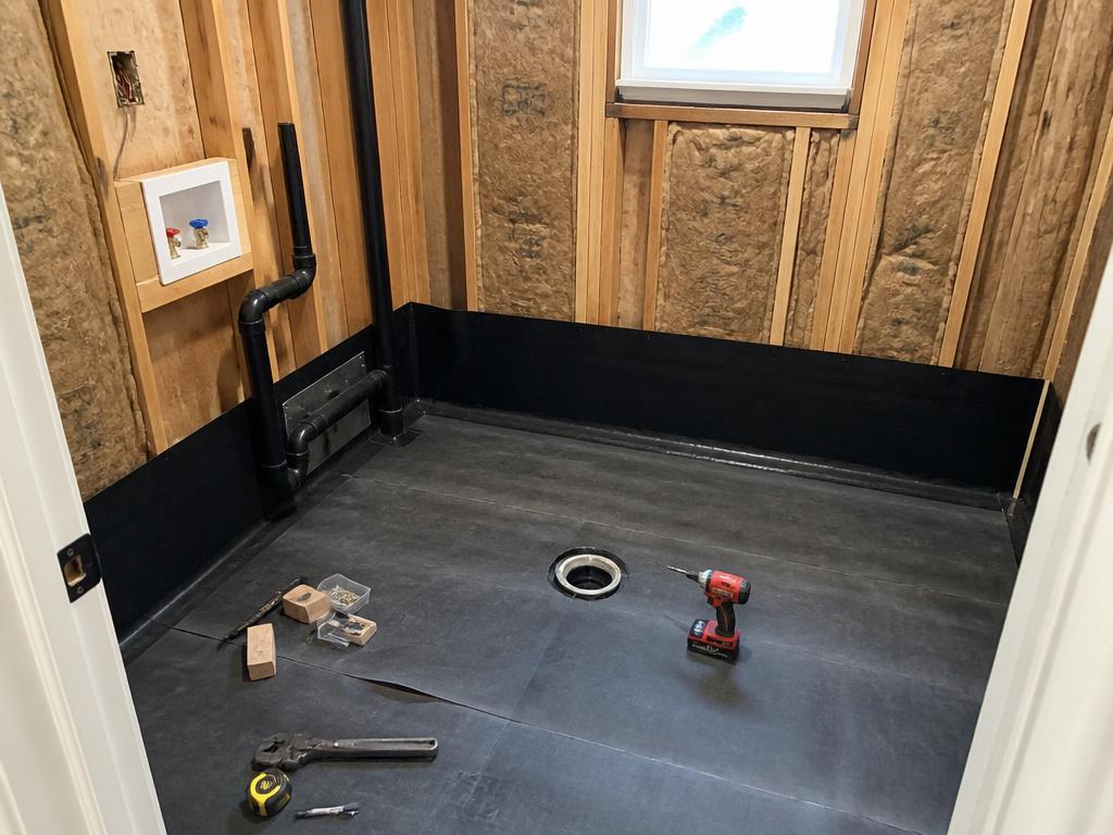 Tvättstuga under renovering – nya rör och eldragningar innan montage